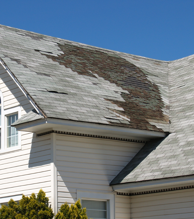 Storm damage repair before picture by Crest Roofing and Gutters