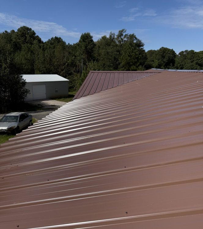 Metal roofing installation by Crest Roofing and Gutters